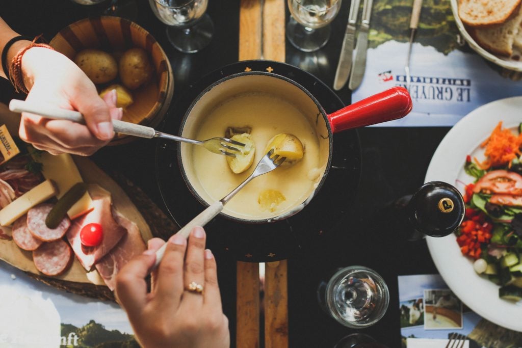 fondue, Switzerland Travel Tips, Things To Know Before Visiting Switzerland, Cheese Fondue, 
swiss food, switzerland food, swiss cuisine, swiss dishes, switzerland traditional food