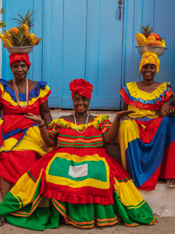 Don’t Do This in Colombia: 22 Things Not to Do in Colombia, Bogota vs Cartagena - Which is the Better Colombian Trip?, Palenqueras in Cartagena Colombia - Santa Marta vs Cartagena