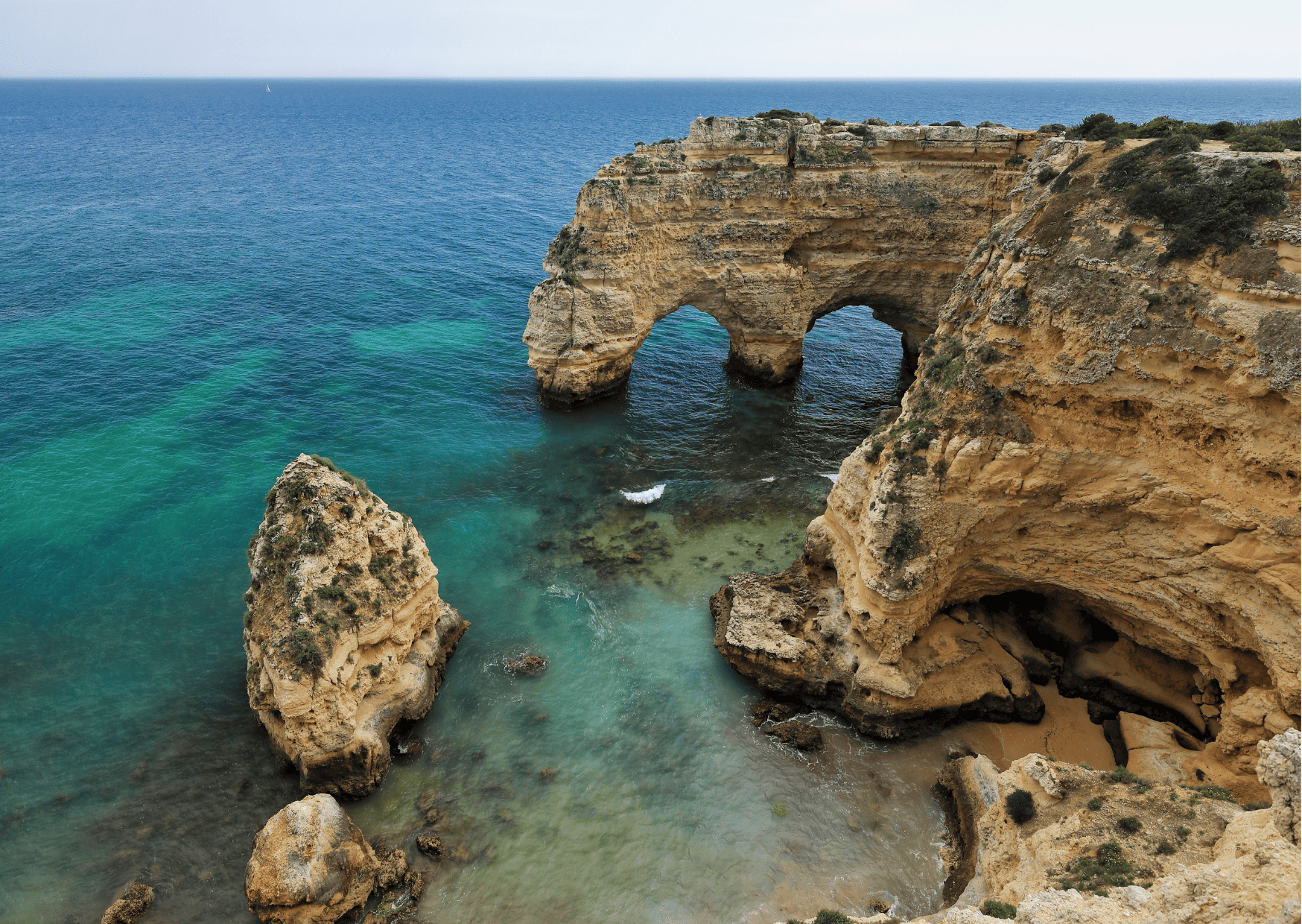 Algarve vs Madeira: Which is Better for Travel in Portugal? 3 Praia da Marinha Algarve vs Madeira Madeira vs Algarve