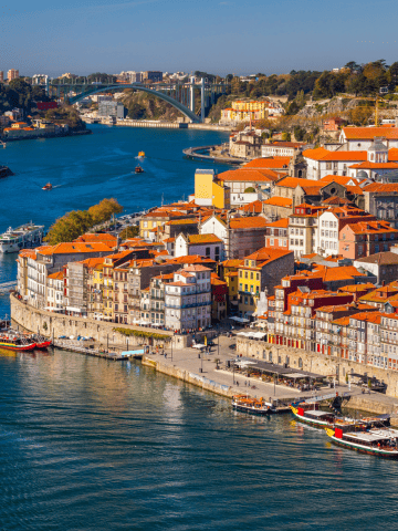 8 Best Places for Living in Europe for Less Than $2,000 USD, 10 Bucket List Destinations In Portugal To Visit, 1 Day in Porto Itinerary - One Day in Porto Itinerary - Porto, Portugal old town on the Douro River