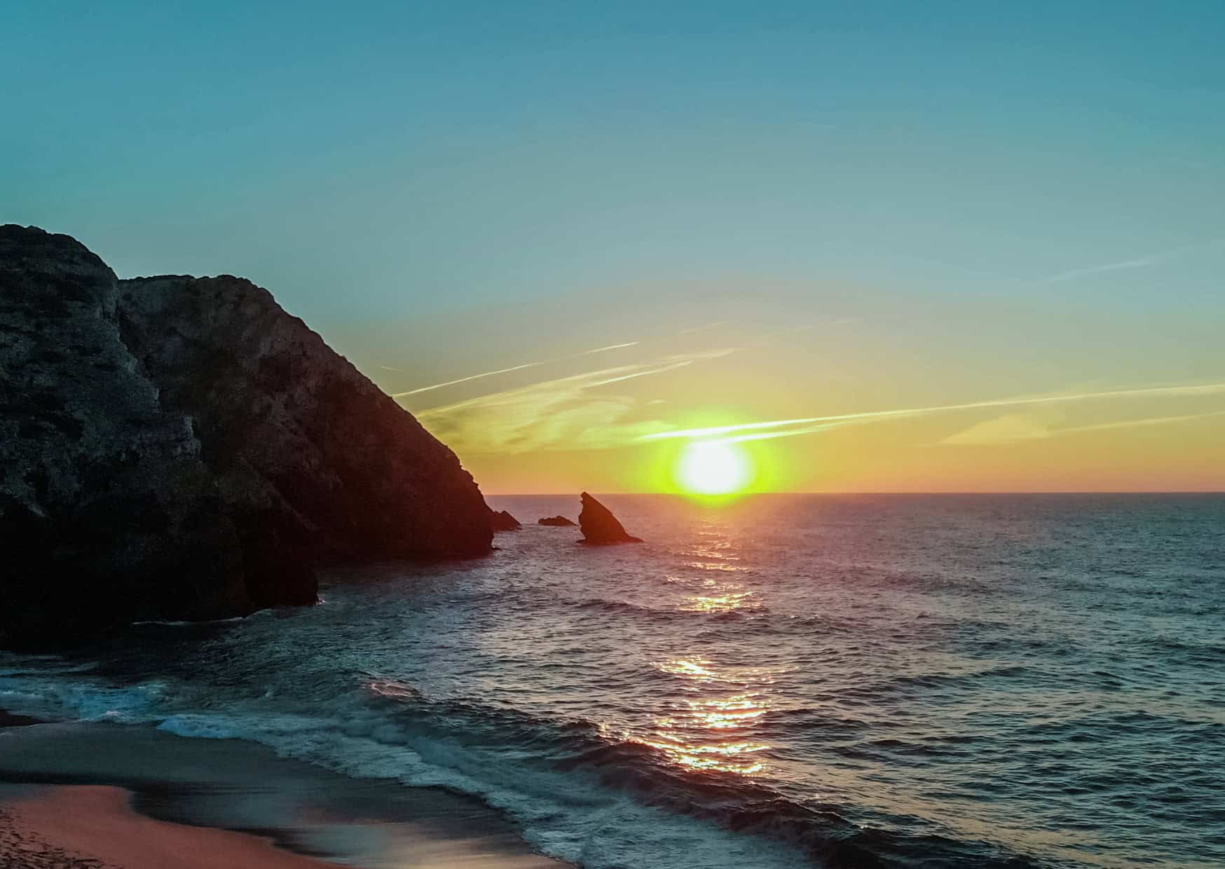 10 Awesome Hidden Beaches in Portugal You've Gotta Visit 4 Praia da Adraga Sintra Hidden beaches in Portugal